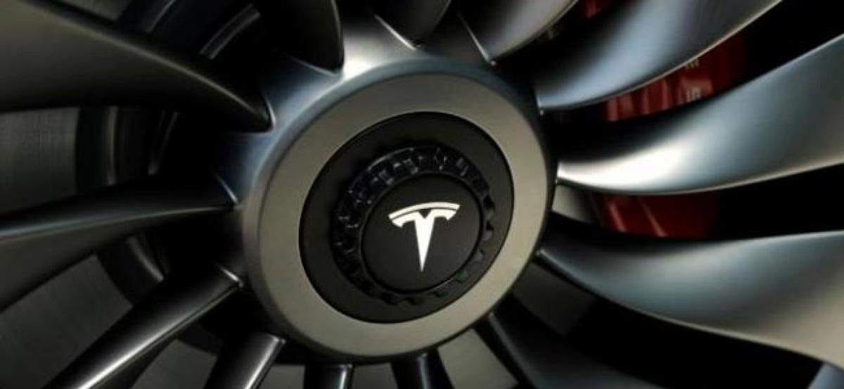 Tesla says Model 3 on track for volume production by September