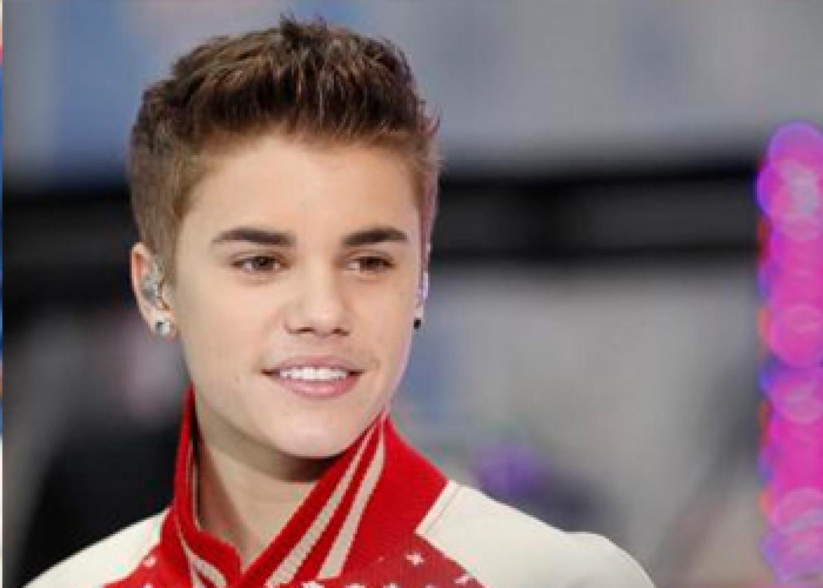 Bieber settles 2013 Paparaazi lawsuit