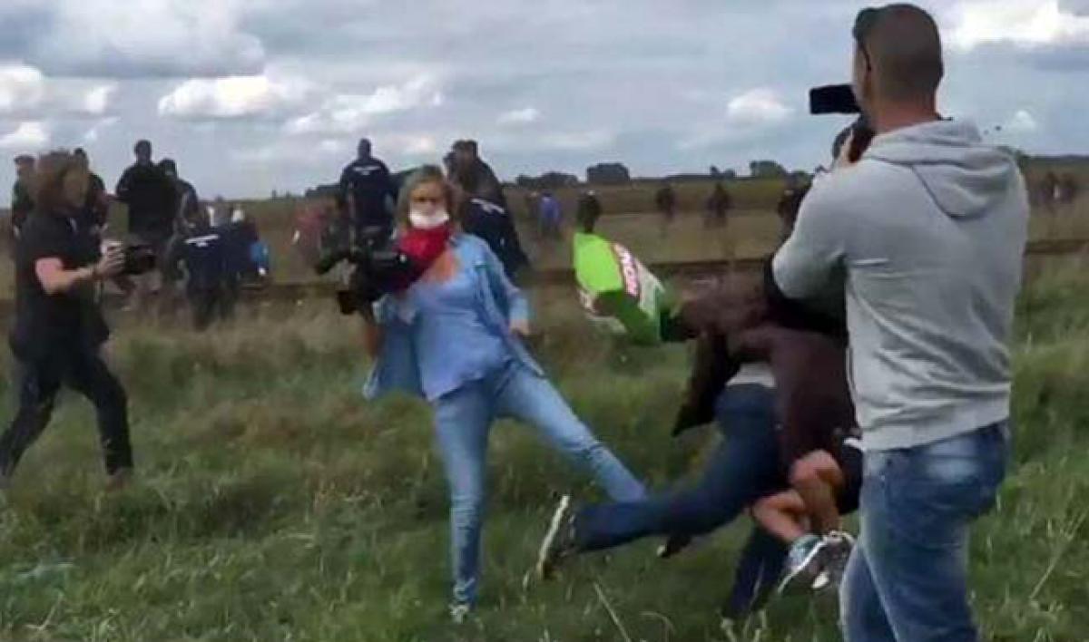 Hungarian journalist fired for tripping Syrian migrants