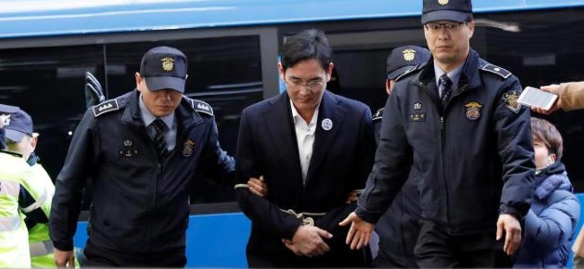 After night in cell, Samsung scion taken for questioning