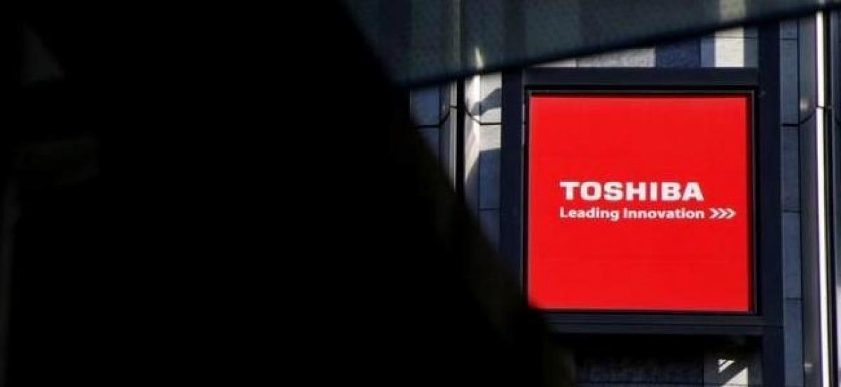 Toshiba CEO says chips stake sale will likely avert negative shareholder equity