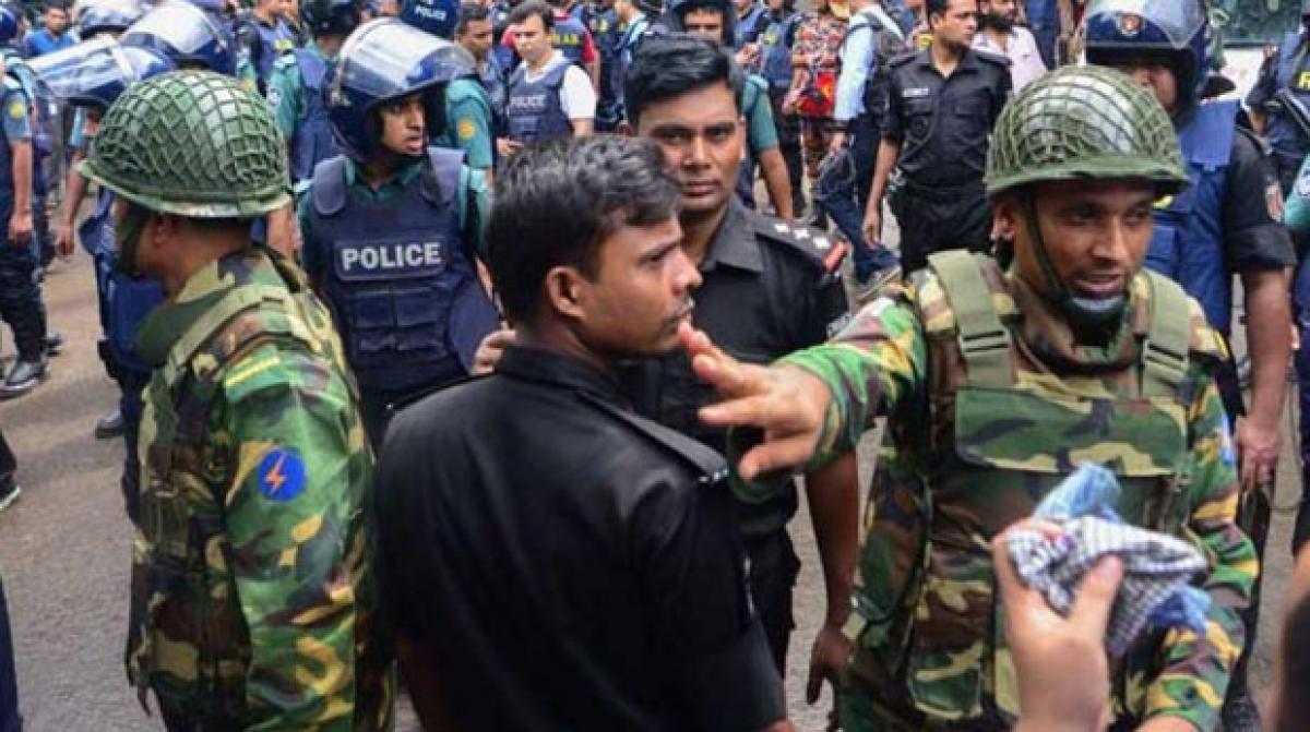 Bangladesh police say may have killed hostage by mistake in cafe siege