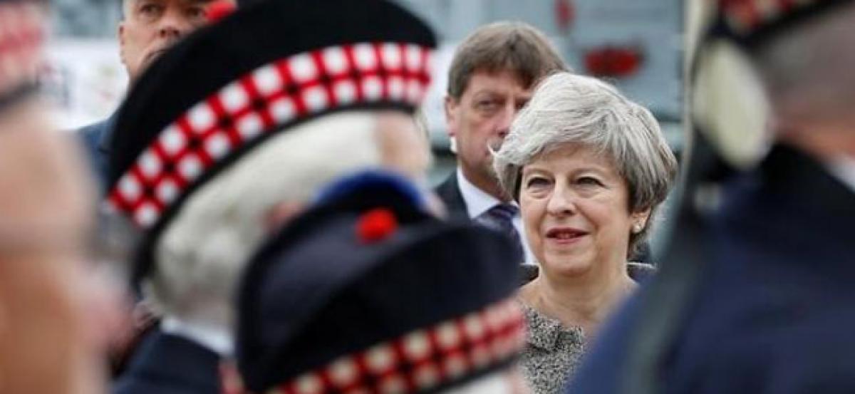 UK PM May nears deal to prop up government with Northern Irish DUP