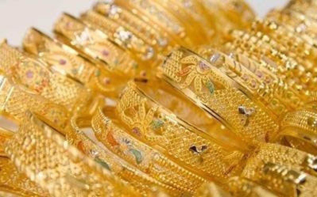 Gold futures climb Rs 88 on global cues