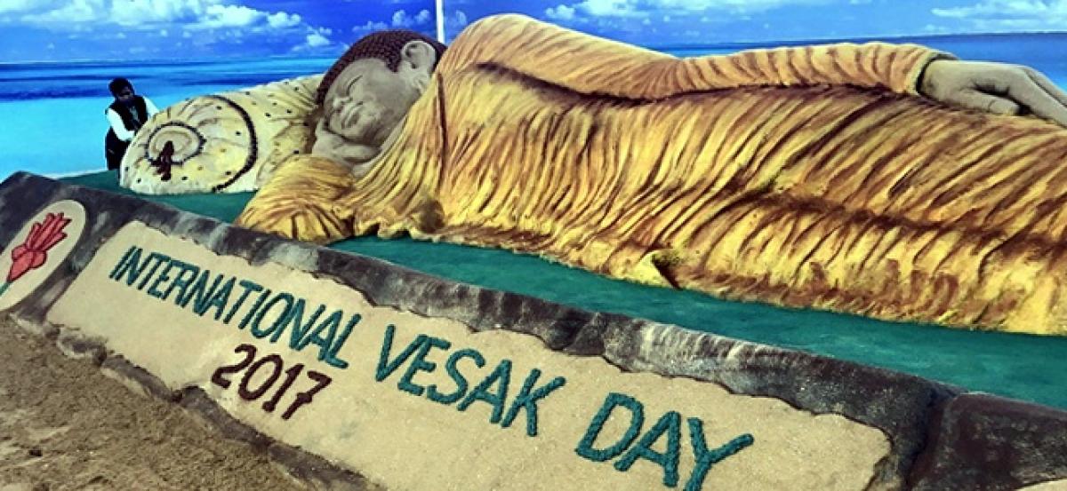 Indian artist creates worlds longest sand Buddha in Lanka