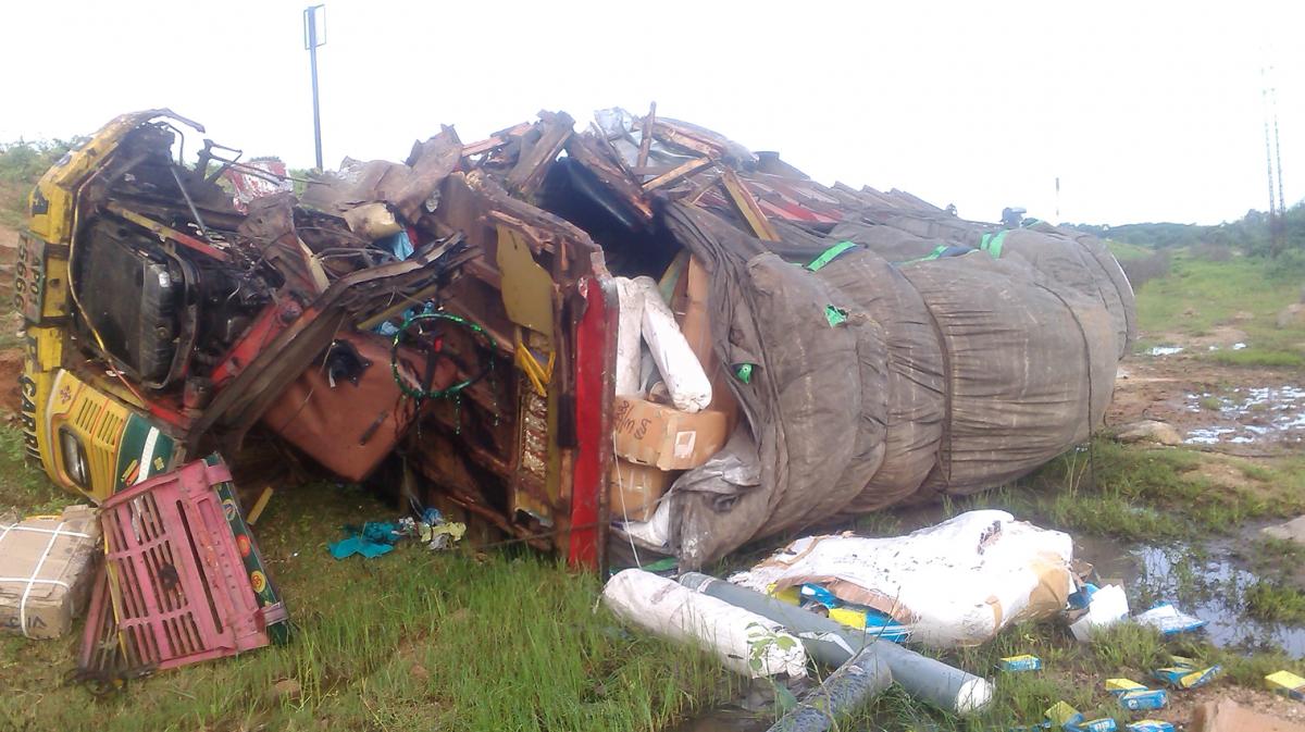 Two killed as lorry hits parked RTC bus