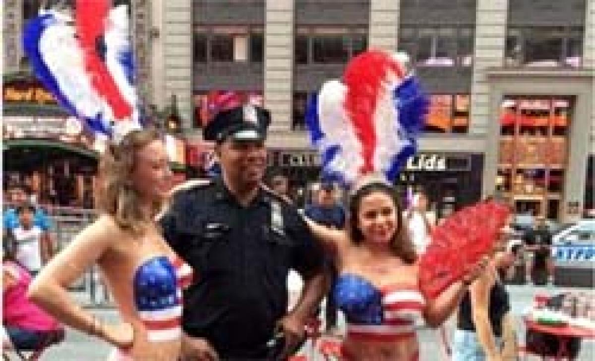Women to parade topless through New York on Sunday.