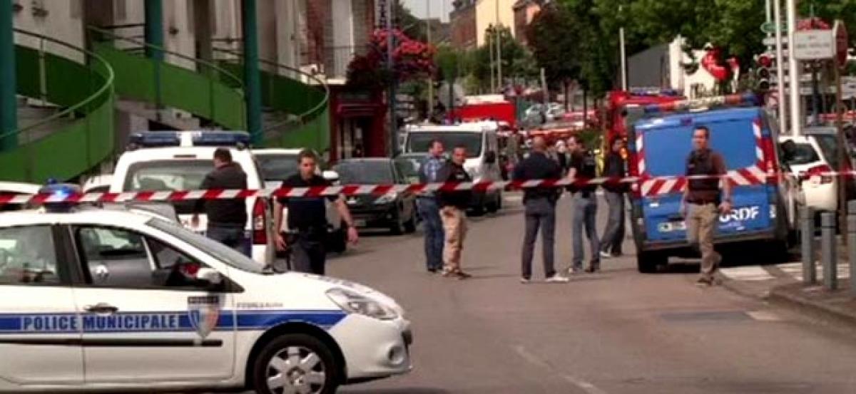 Armed men take hostages in France church