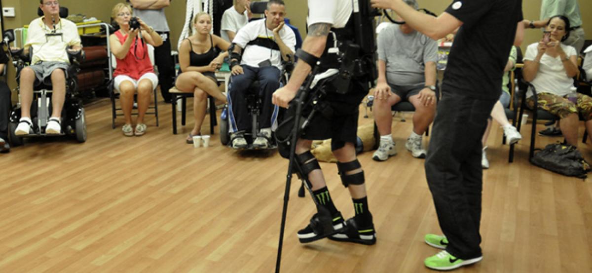 Lower-limb wearing robot to help paralytic patients move