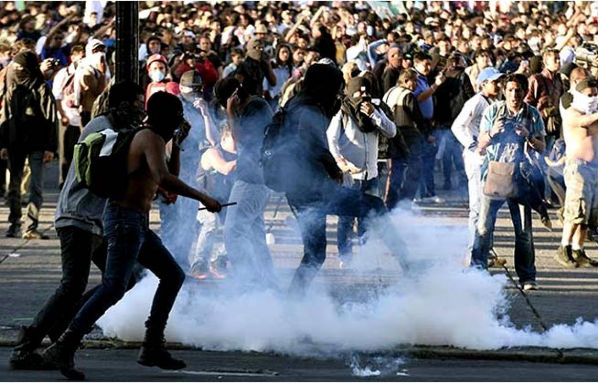 Mexico City Massacre Protest results in clashes