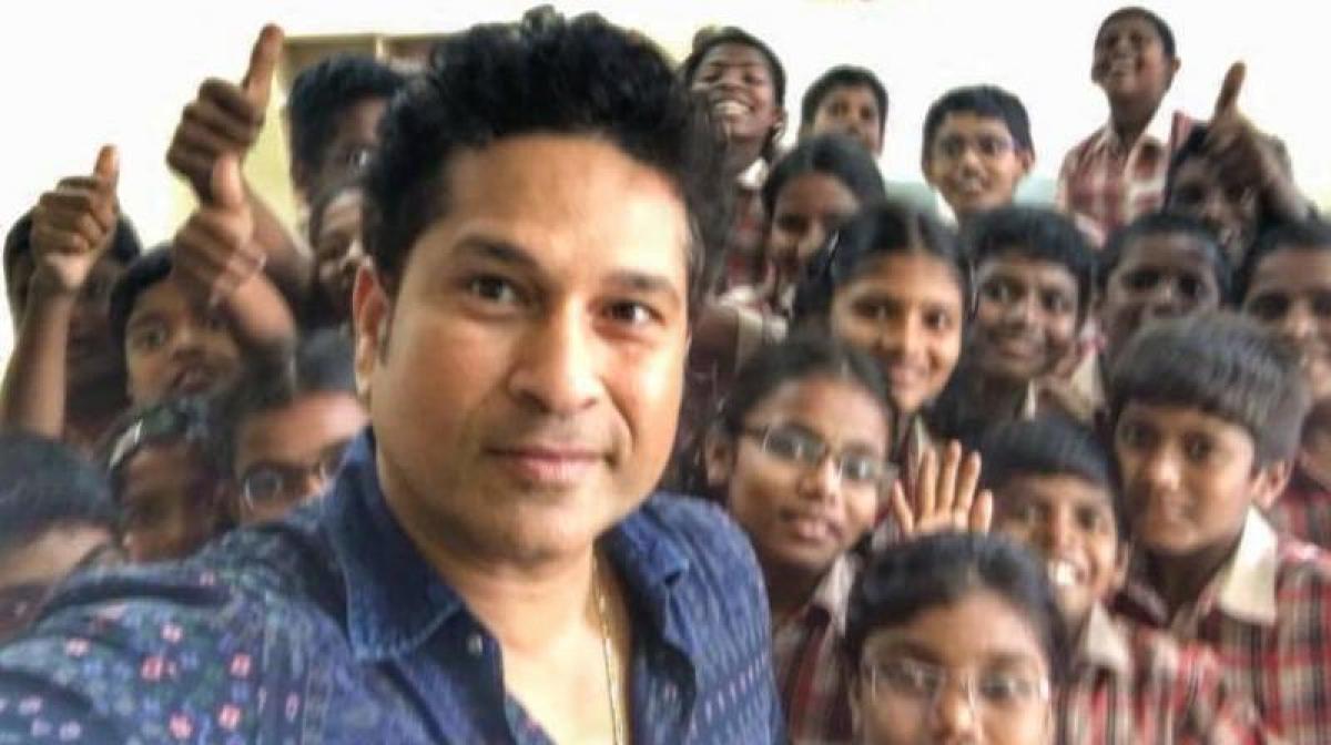 Sachin Tendulkar keeps his promise, visits adopted village in AP