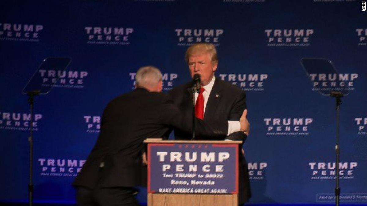 False gun scare at Nevada rally leads to panic, Trump rushed off stage