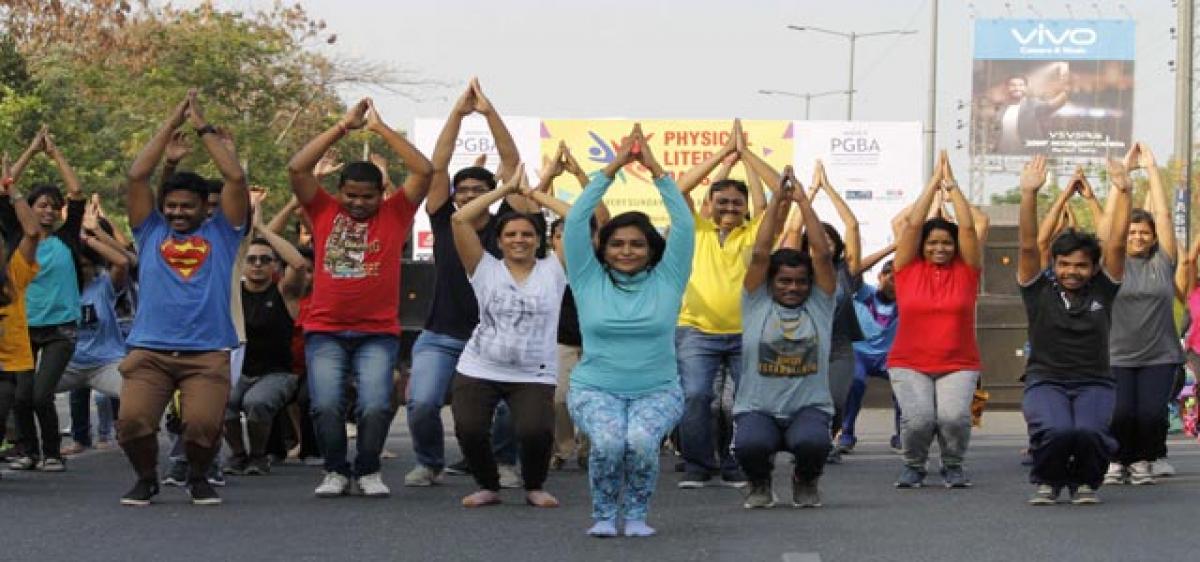 PL Days holds a partner yoga session