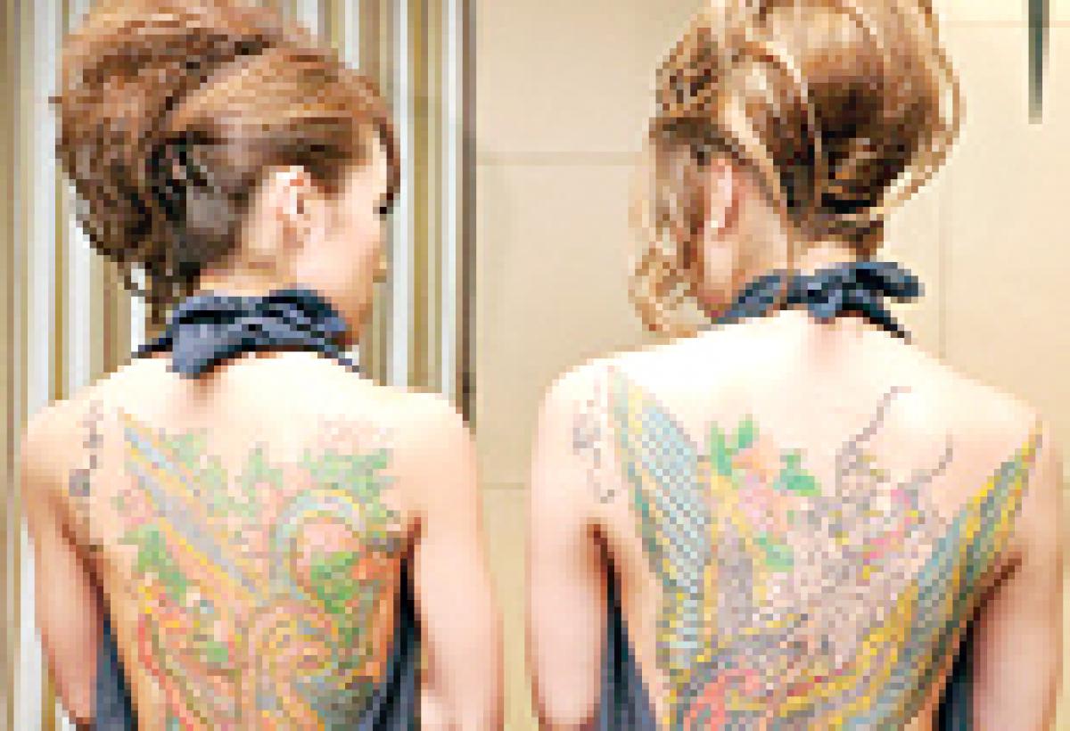 Japan to review tattoo ban