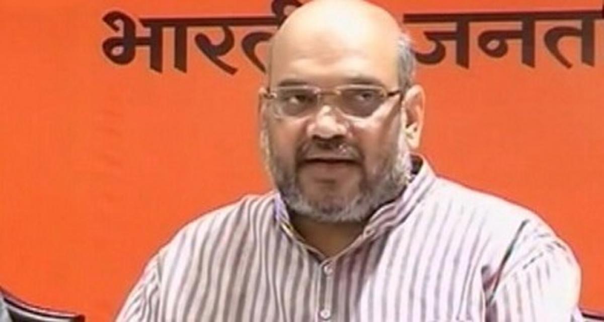 Gogoi govt in trouble, 9 Congress MLAs meet Amit Shah