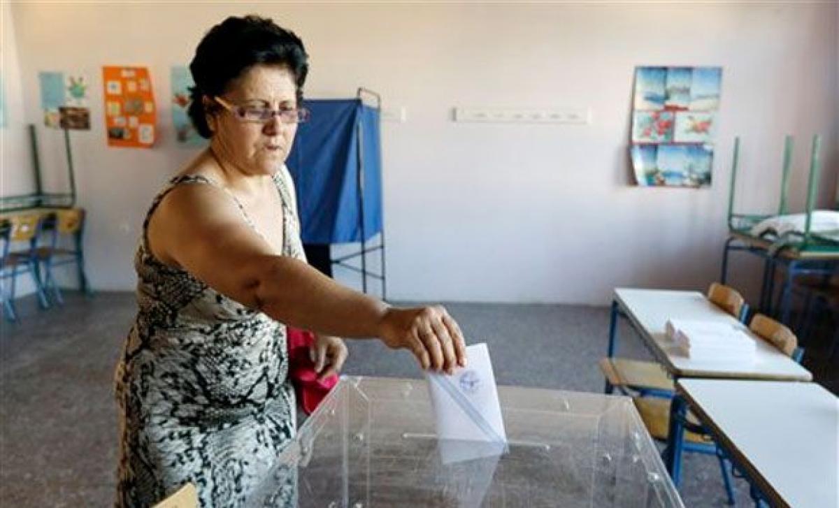 I pray on my knees: Hopes, fears as Greece votes in referendum