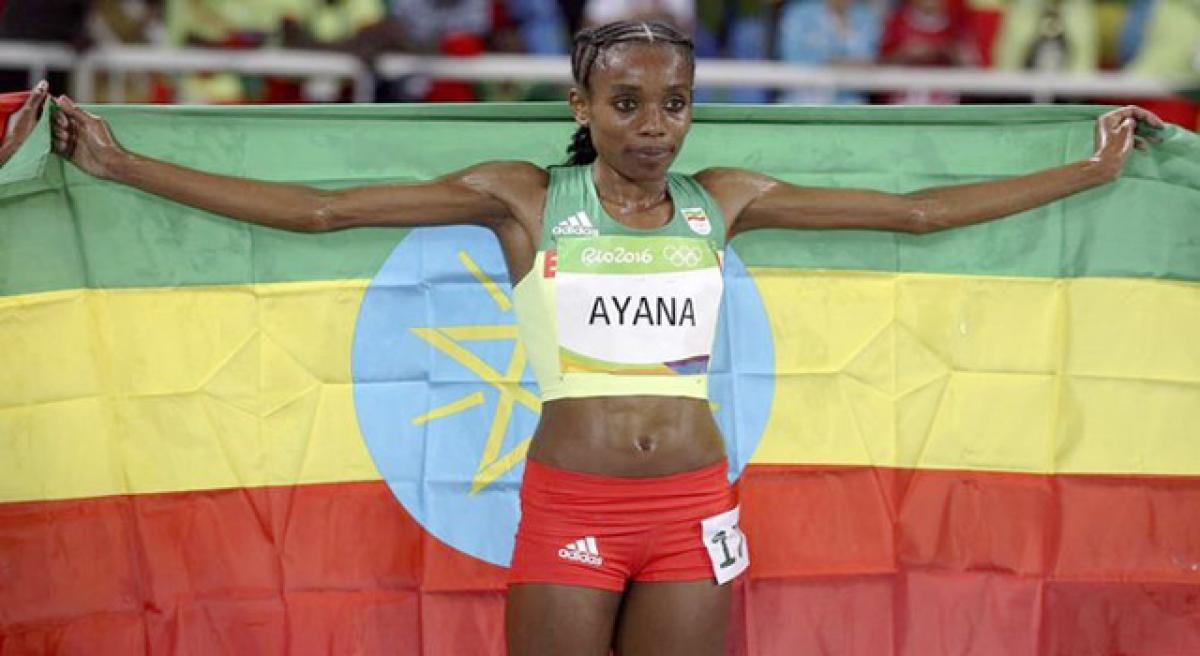 Record-breaking Ethiopian Ayana brushes doping suspicions.