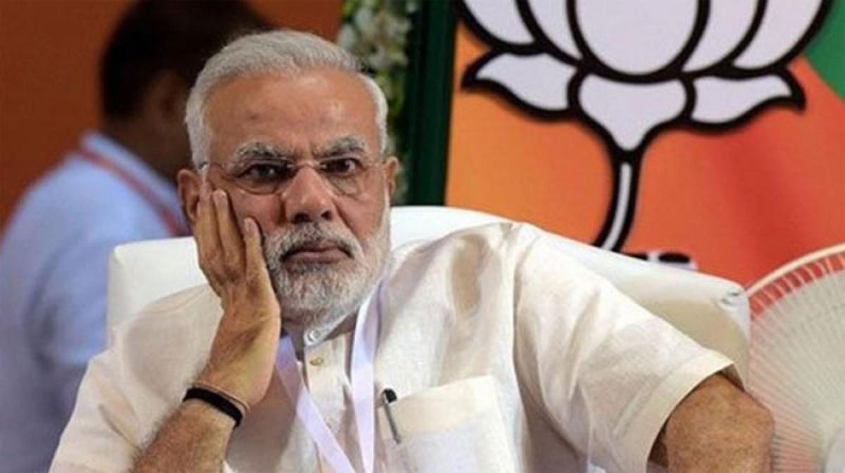 Congress targets Modi for alleged gas scam, forces adjournments in House