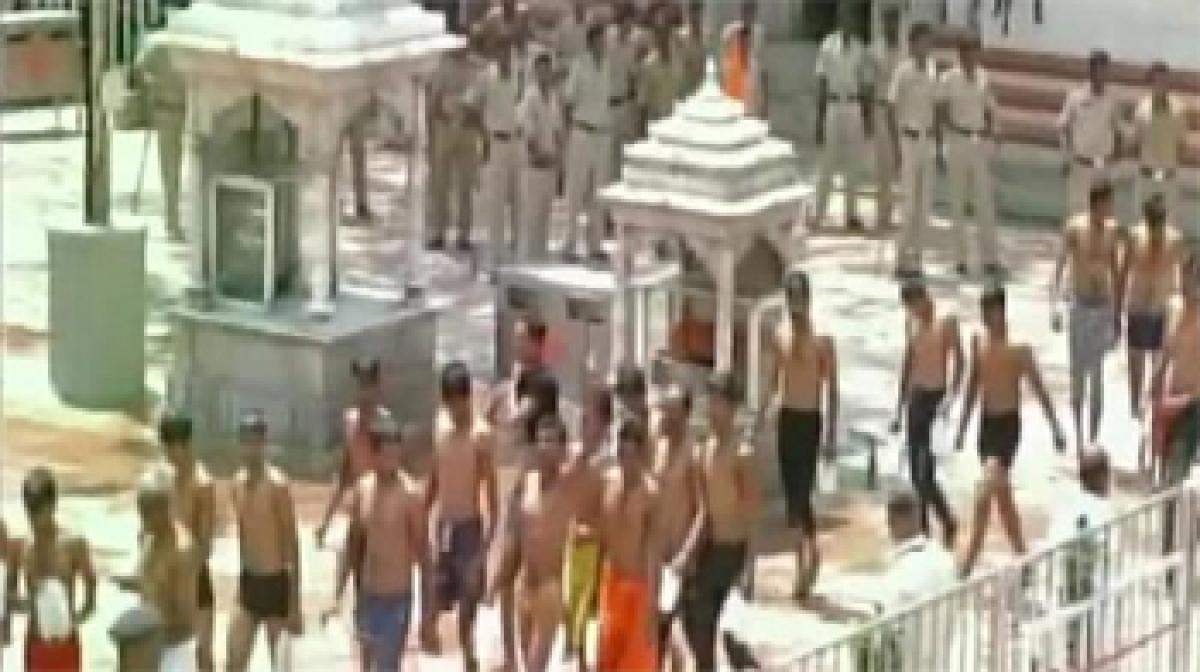 Defying trust orders, men barge into inner sanctum of Shani temple