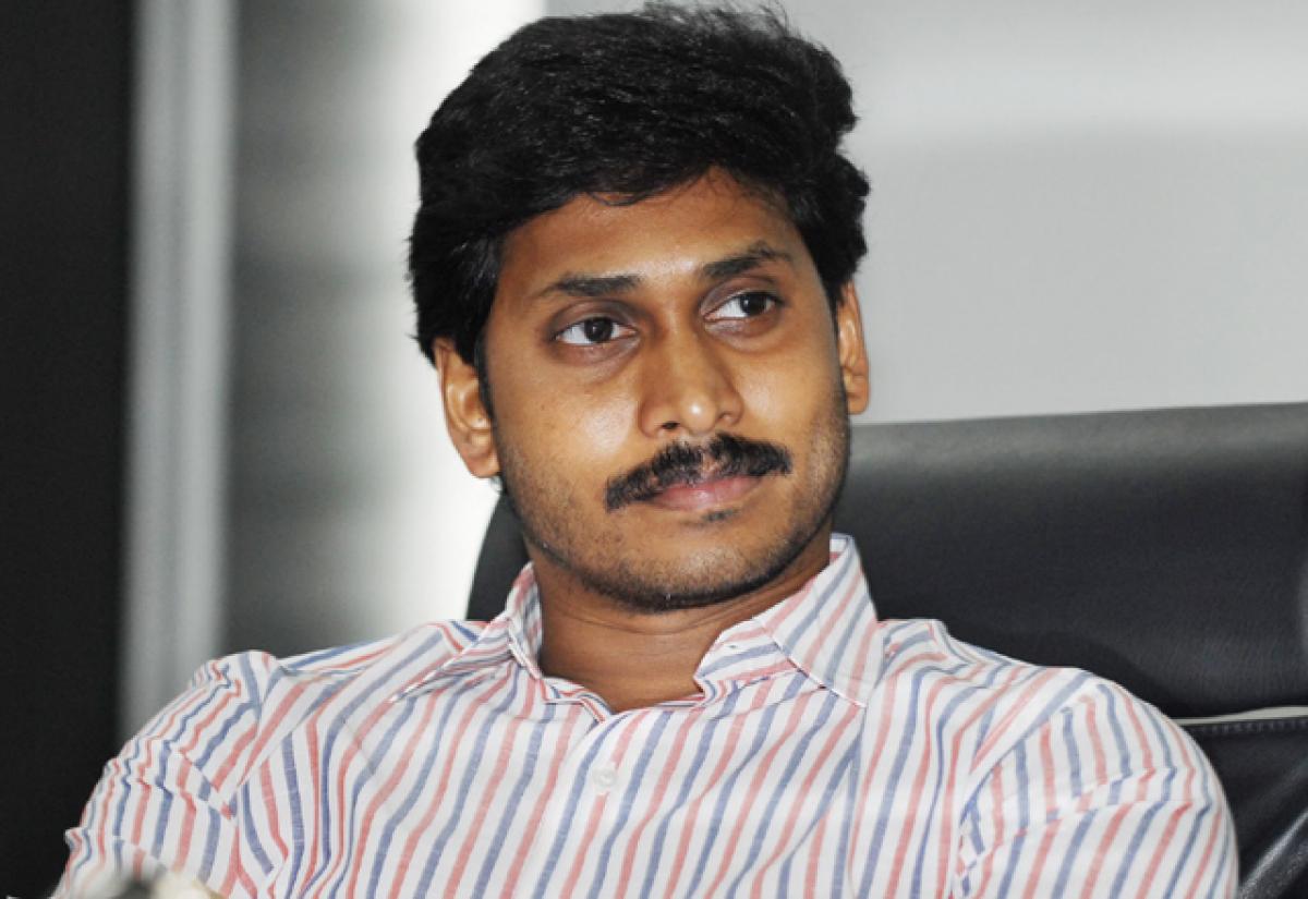 YS Jagan takes holy dip in Godavari Pushkar ghat Kovvuru