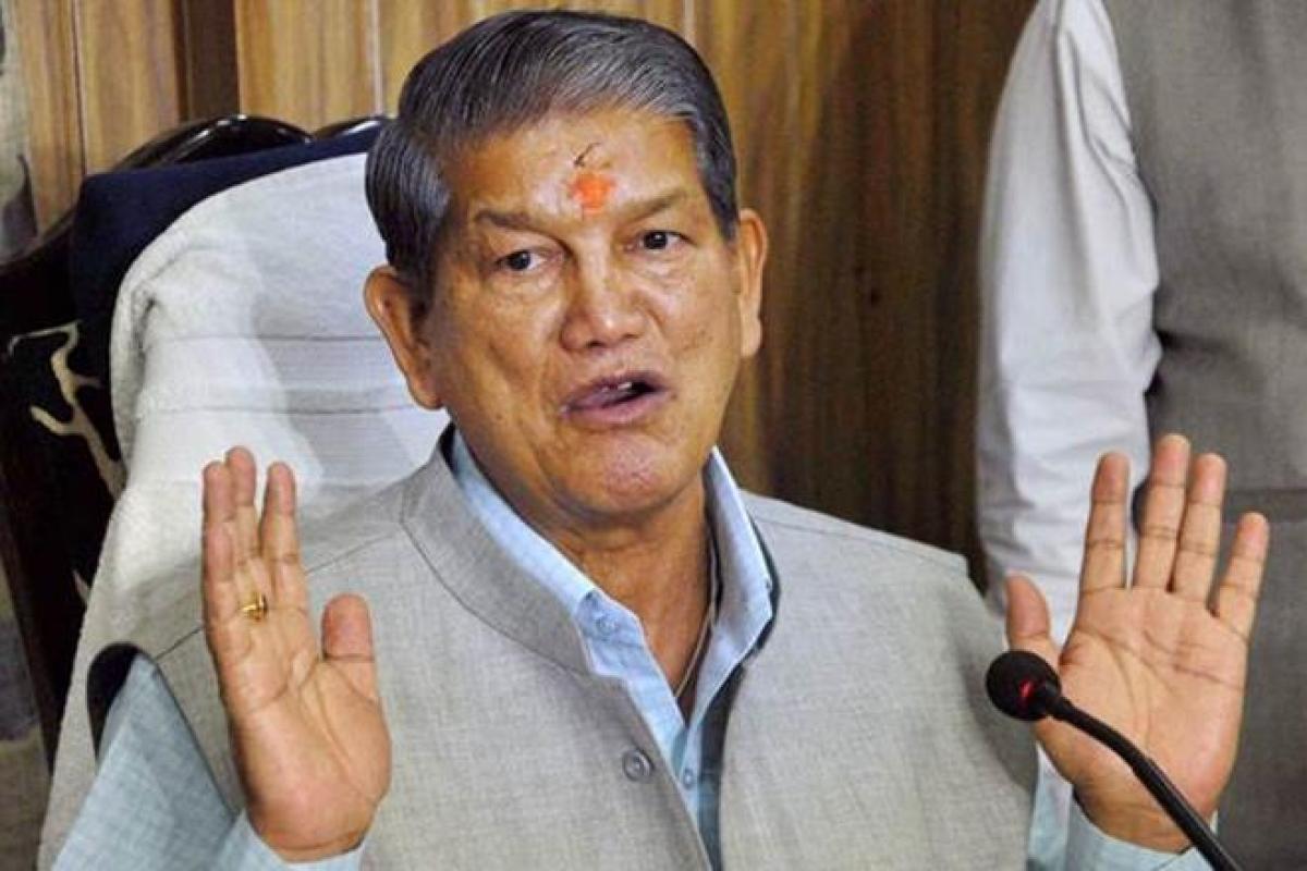 BJP lashes out at Harish Rawat over charges of fielding dummy candidates