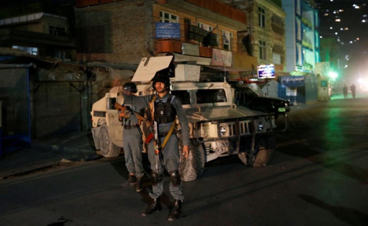 Gunman kills 14 in Kabul attack on Shiite shrine