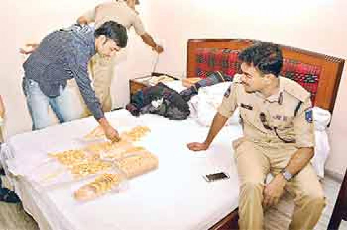 Cyberabad cops seize 8 kg gold, gun