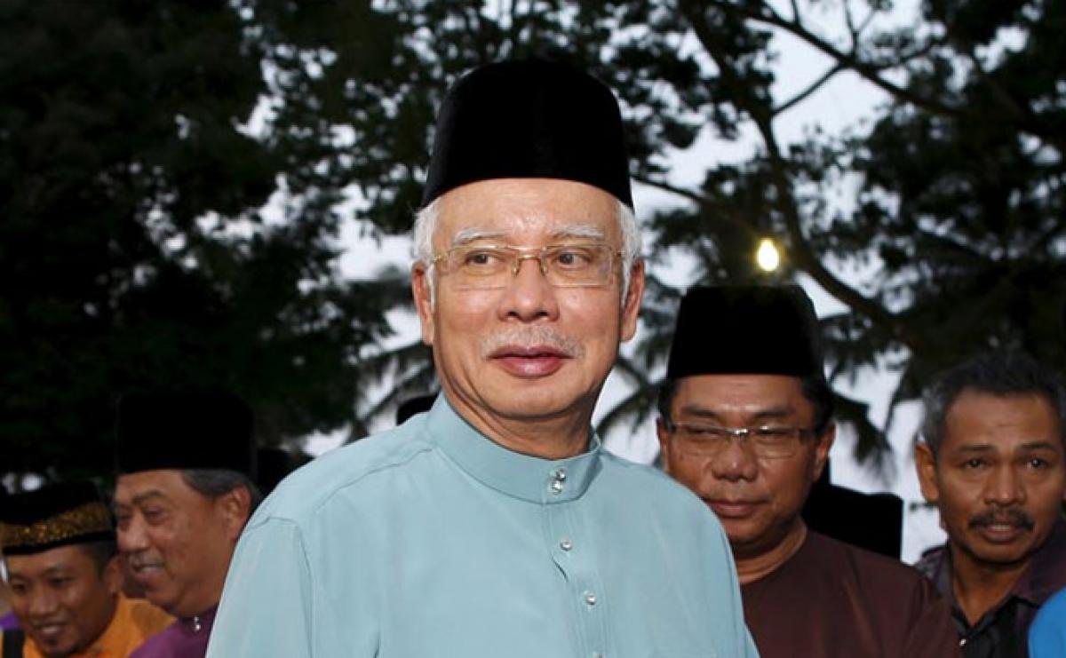 Malaysia seeks criminal probe into PM scandal