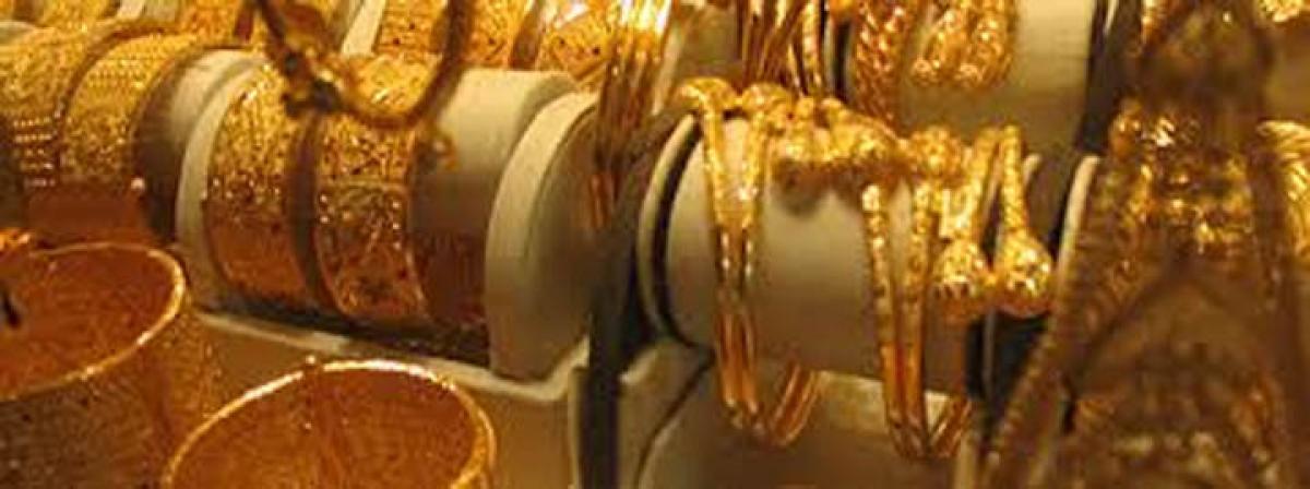 Gold futures up by Rs 84 on firm global cues