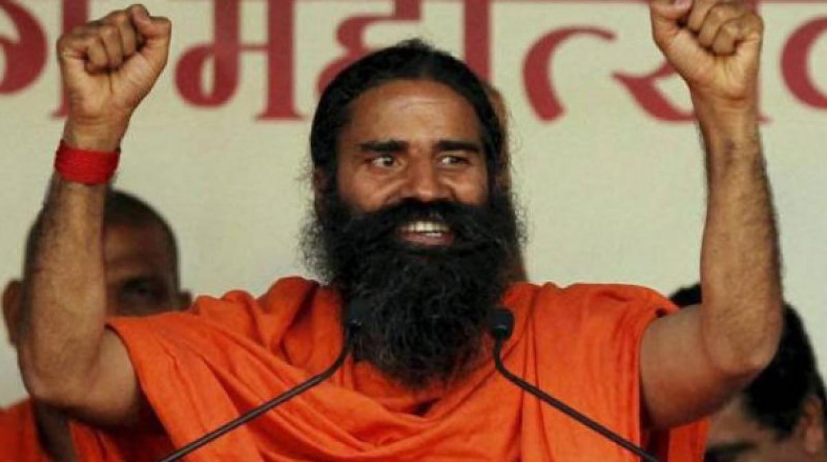 Baba Ramdev to promote football for Modis cleanliness drive