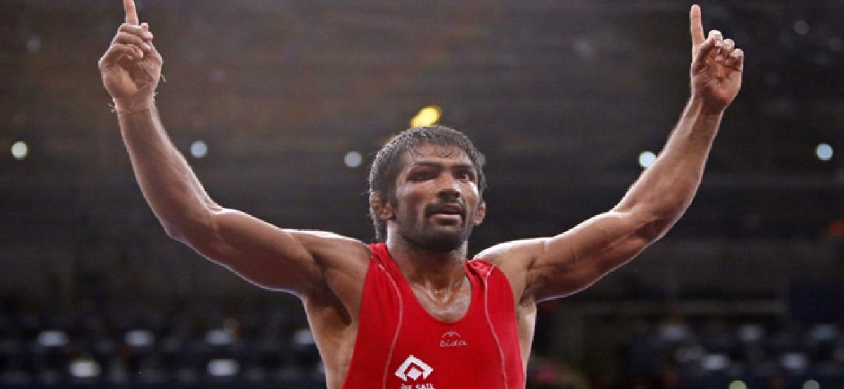Wrestler Yogeshwar out of medal contention.