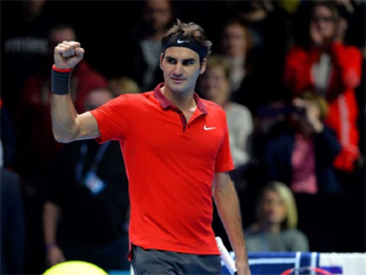 Landmark wins for Federer, Sharapova