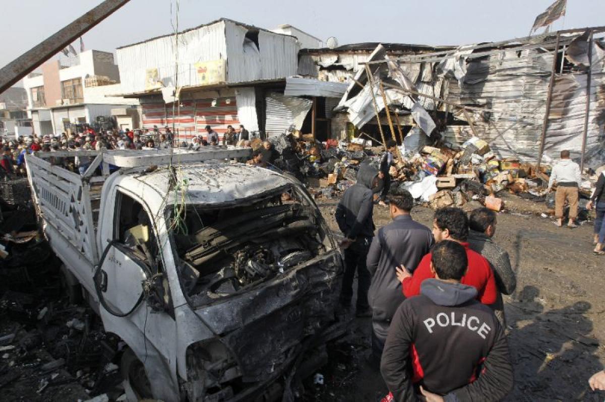 IS suicide bombing kills at least 12 at Baghdad market