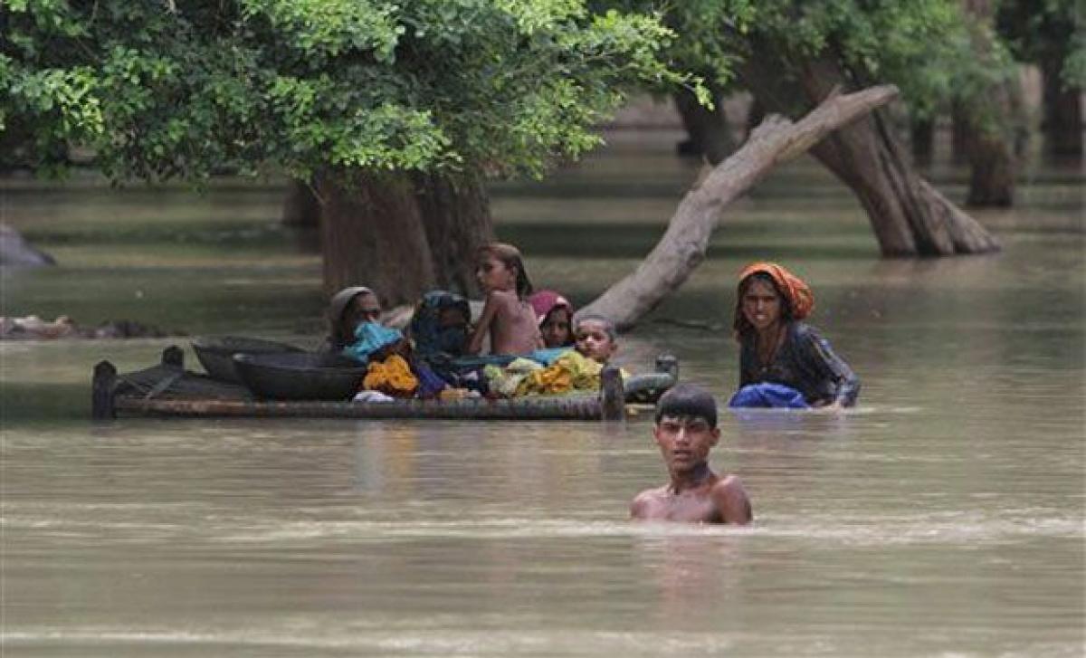 Heavy monsoon rains flood Pakistan, destroy homes