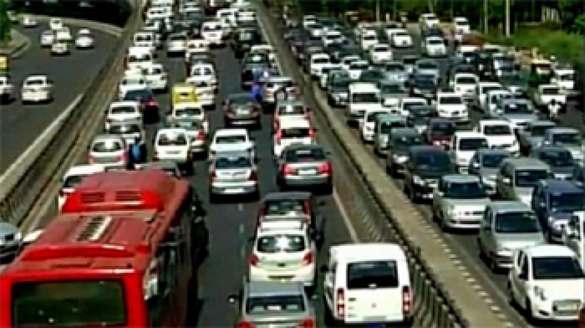 Traffic woes for commuters as protesting cabbies block highway