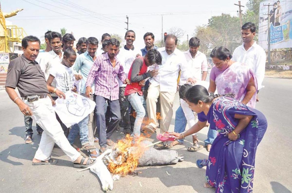 Madiga Reservation Porata Samithi leaders burn CM effigy