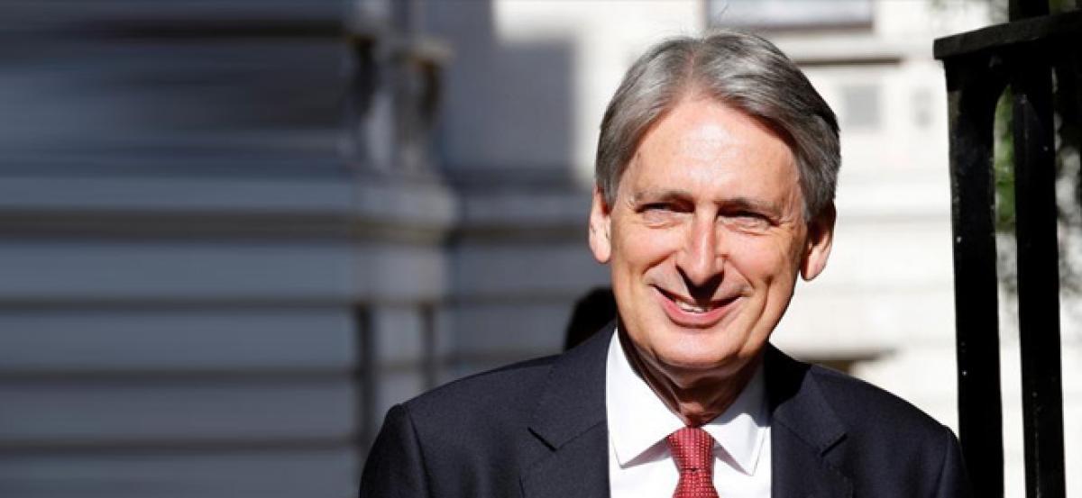 UK finance minister Hammond seeks pragmatic Brexit