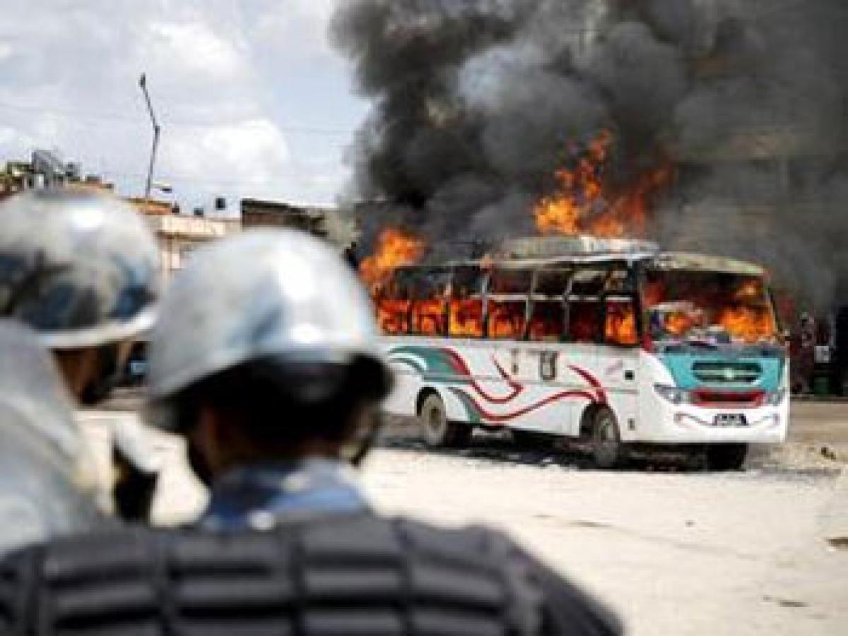 Tension in Assam town after bus set ablaze