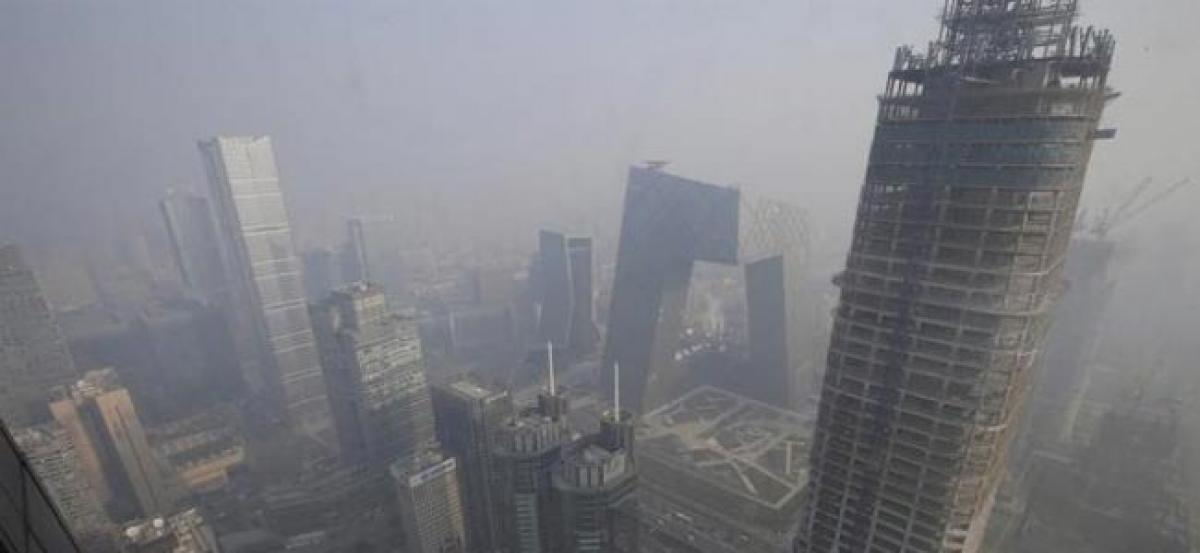 Beijing to ban polluting cars during smog alerts