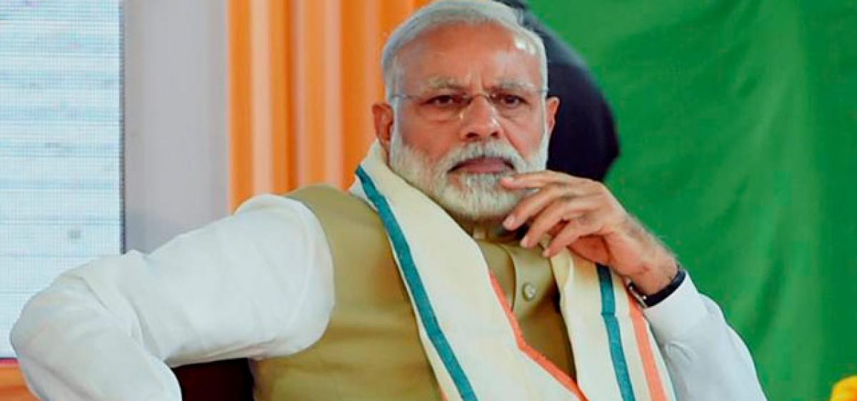 Govt firm on its black money promise: Modi