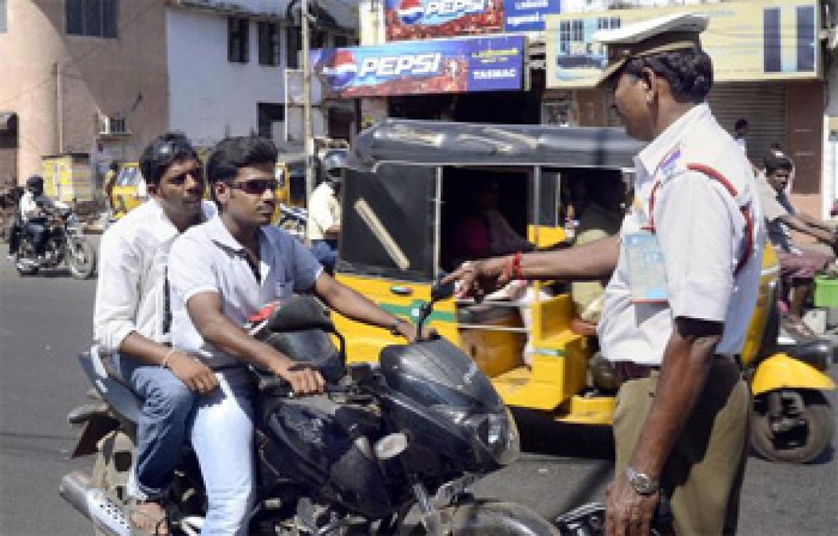 1,800 bikers fined for not wearing helmets