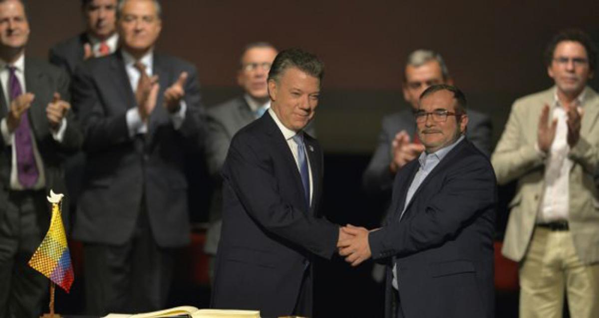 Colombia Prez and Marxist FARC rebel leader sign peace accord in a sober ceremony