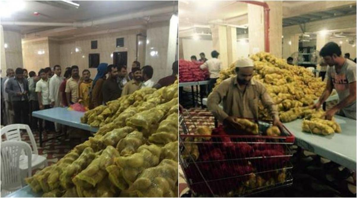 Jobless Indians in Saudi Arabia queue up for food