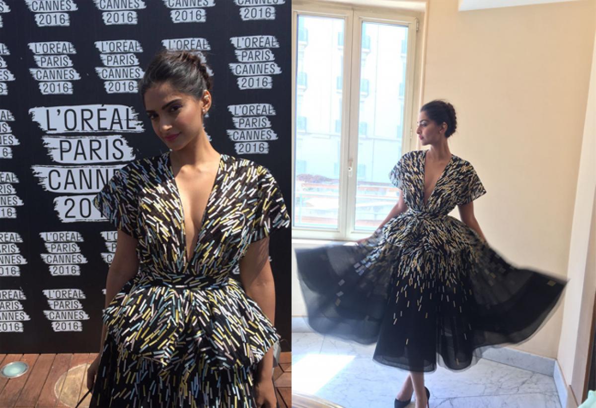 Sonam sports linear pattern by Ralph and Russo at Cannes