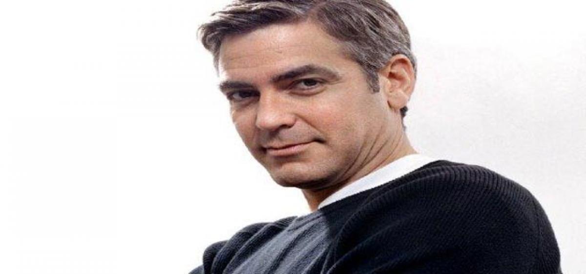 Clooney developing movie on rescuers in Syria