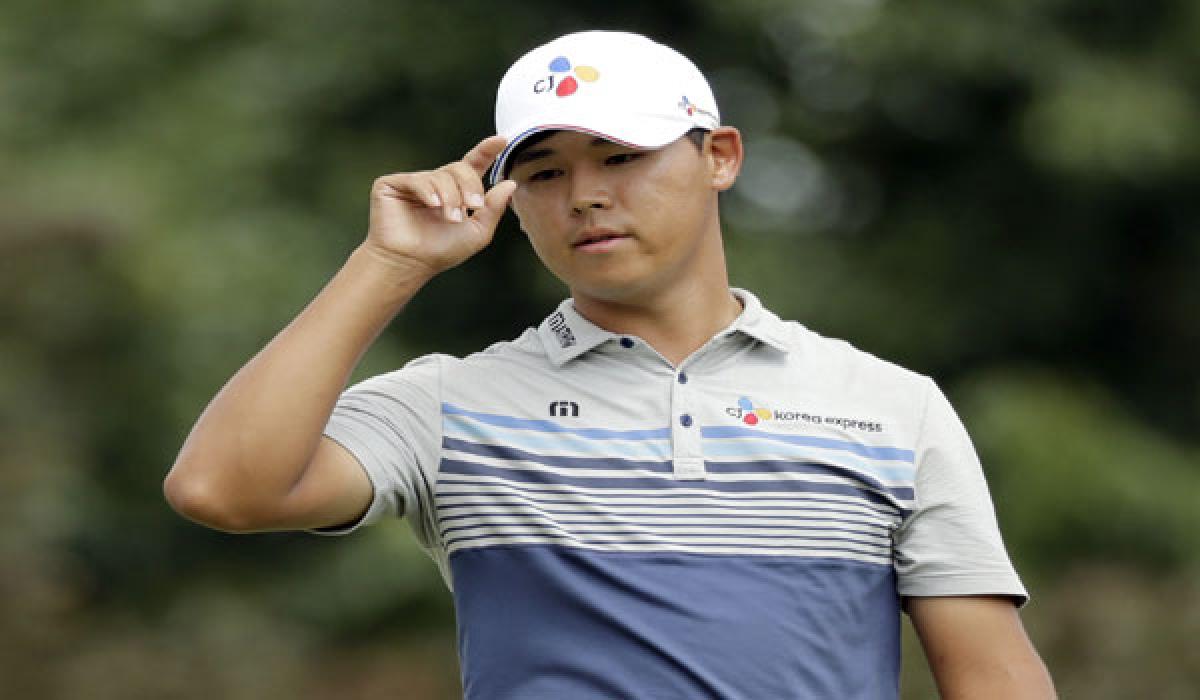 Kim pips Woods to youngest champ feat