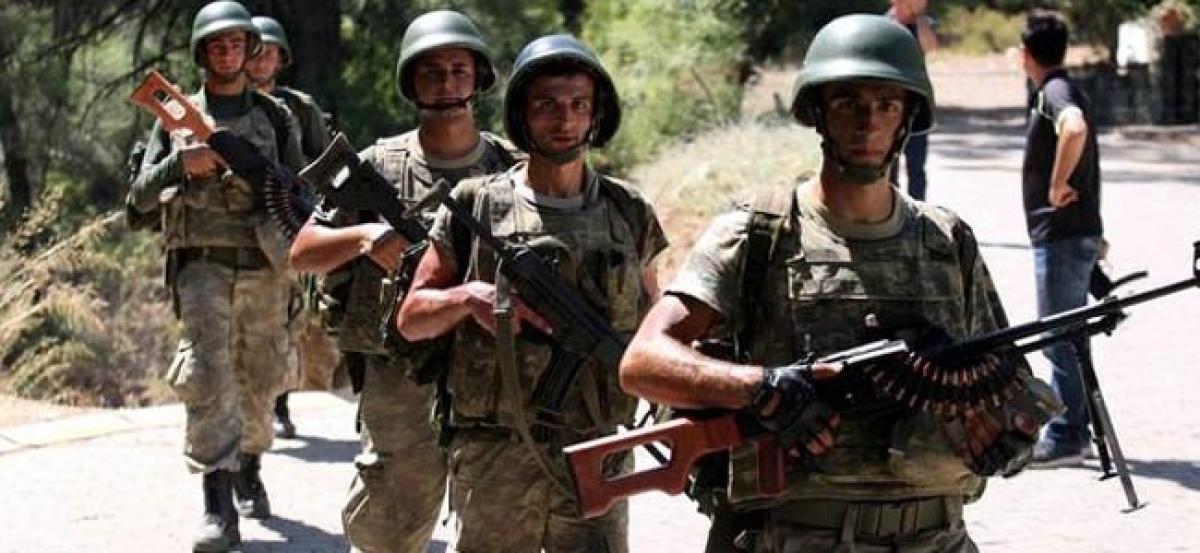 Turkish Troops hunt coup plotters as crackdown expands
