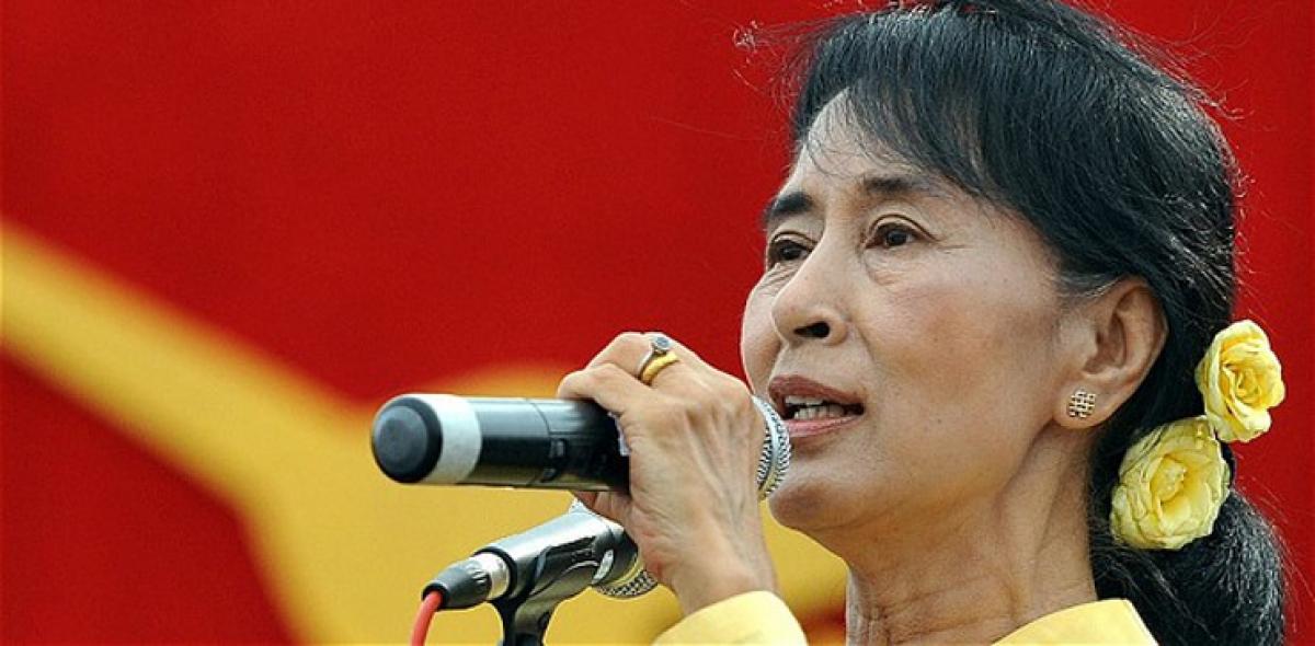 Myanmar opposition leader Suu Kyi urges rebel groups not to rush peace deal