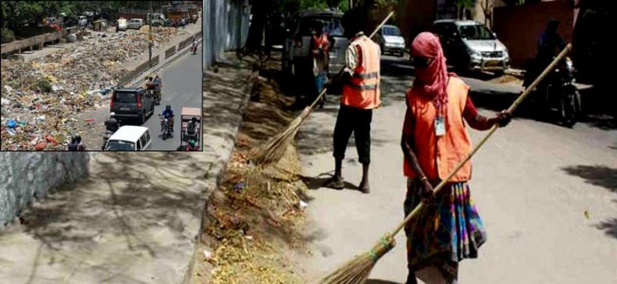 MCD sanitation workers dump muck on streets, go on strike