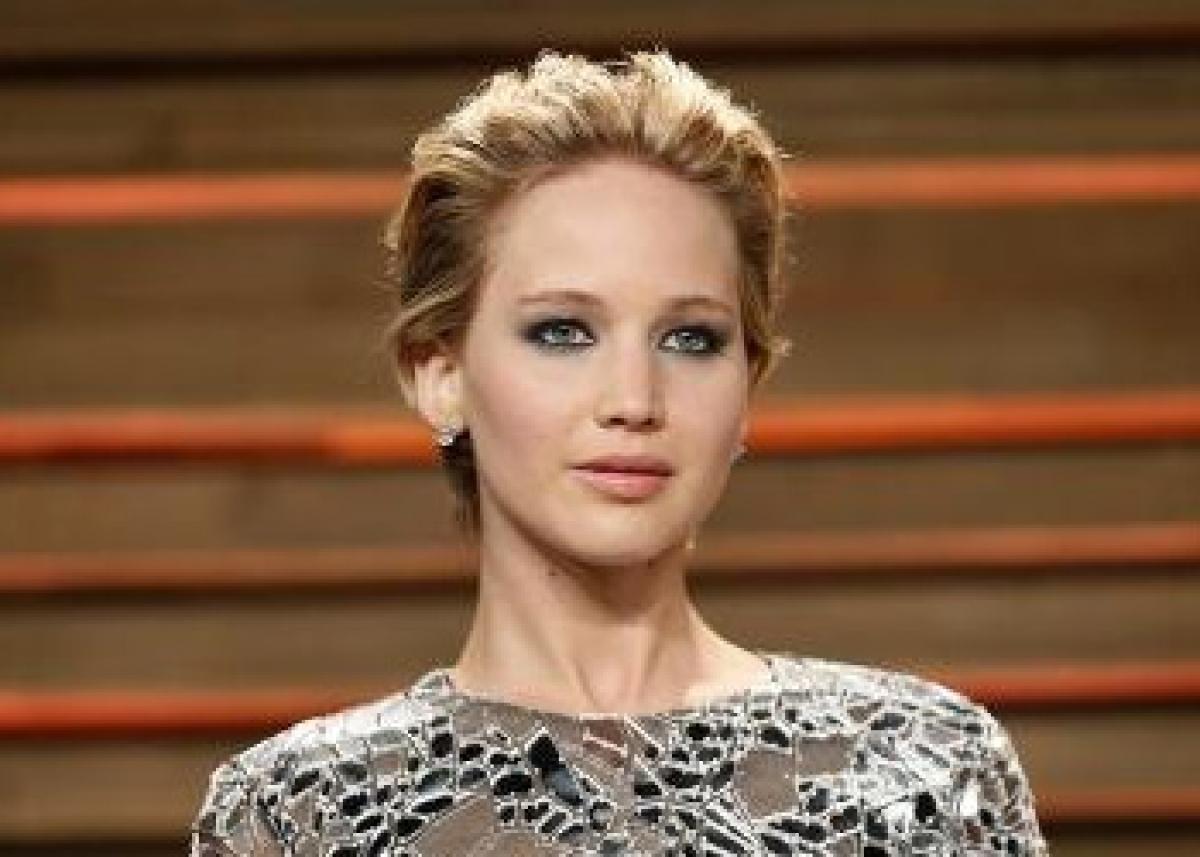 `Happily single` J-law not dating Chris Evans